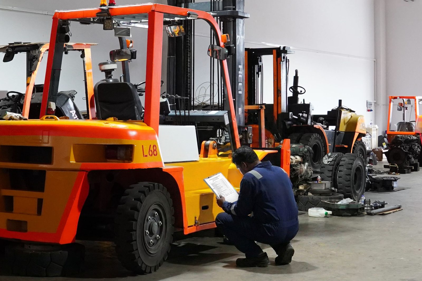 Forklift inspection and diagnostic check at LB Industrial workshop, Singapore